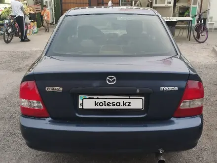 Mazda 323 2000 года за 1 300 000 тг. в Алматы – фото 4