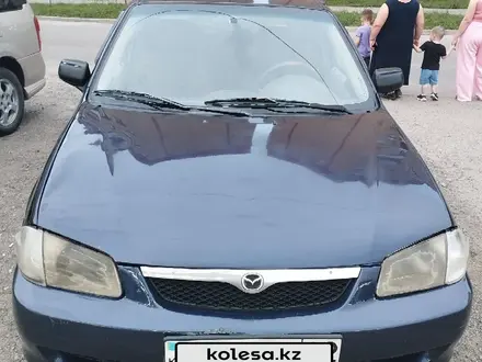 Mazda 323 2000 года за 1 300 000 тг. в Алматы – фото 5