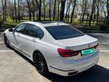 BMW 750 2016 года за 37 400 000 тг. в Астана – фото 4