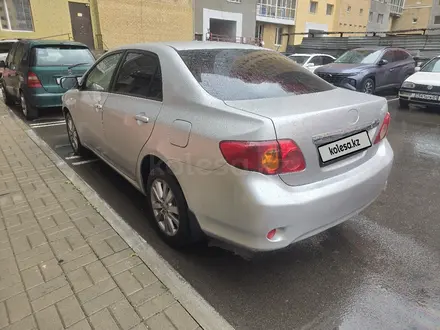 Toyota Corolla 2007 года за 4 500 000 тг. в Астана – фото 3