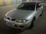 Mitsubishi Carisma 1997 года за 1 250 000 тг. в Уральск – фото 2