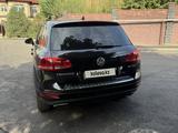 Volkswagen Touareg 2011 года за 8 000 000 тг. в Алматы – фото 4