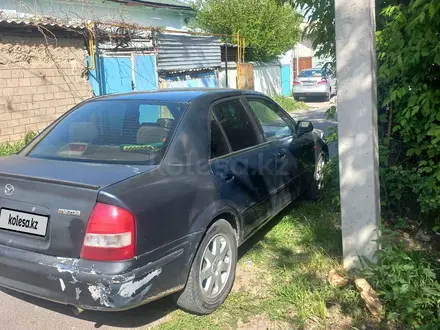 Mazda 323 1999 года за 1 600 000 тг. в Шымкент – фото 4
