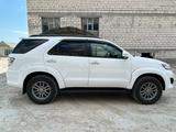 Toyota Fortuner 2015 года за 11 500 000 тг. в Жанаозен – фото 2