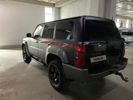 Nissan Patrol 2008 года за 10 500 000 тг. в Астана – фото 21