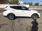 Hyundai Santa Fe 2017 года за 13 500 000 тг. в Байконыр – фото 4