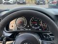 BMW M5 2012 года за 23 500 000 тг. в Алматы – фото 18