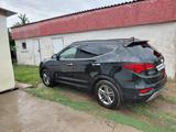 Hyundai Santa Fe 2016 года за 9 500 000 тг. в Уральск – фото 2