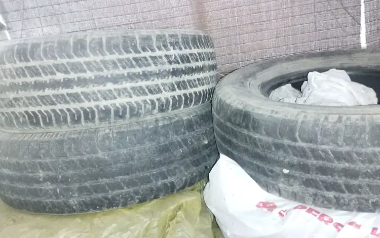 Шины 235/70 R 16 б/у 3шт по20 000т штука. за 10 000 тг. в Алматы