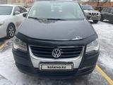 Volkswagen Touran 2010 года за 4 750 000 тг. в Астана – фото 2