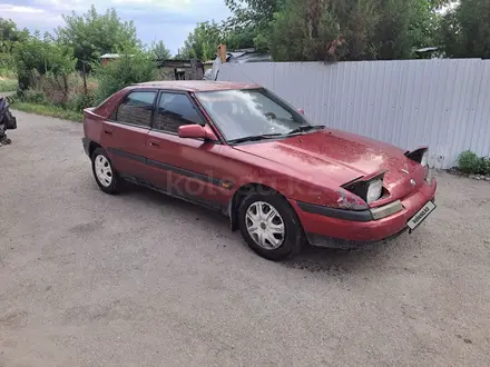 Mazda 323 1993 года за 450 000 тг. в Жетиген – фото 3