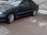 Mazda 626 1998 года за 1 800 000 тг. в Актобе – фото 2