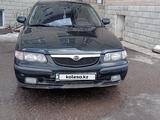 Mazda 626 1998 года за 1 800 000 тг. в Актобе – фото 3