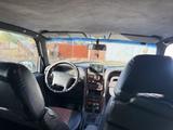 SsangYong Korando 1999 года за 2 600 000 тг. в Караганда – фото 3