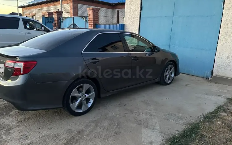 Toyota Camry 2013 годаfor5 400 000 тг. в Атырау