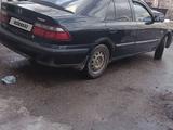 Mazda 626 1998 года за 1 400 000 тг. в Актобе – фото 3