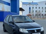 Renault Logan 2011 года за 2 600 000 тг. в Атырау – фото 2