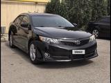 Toyota Camry 2013 года за 5 500 000 тг. в Жанаозен