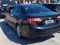 Toyota Camry 2013 годаfor8 800 000 тг. в Актобе