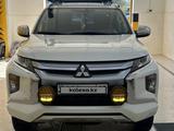 Mitsubishi L200 2023 годаfor14 200 000 тг. в Актау – фото 2