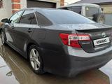 Toyota Camry 2014 года за 7 100 000 тг. в Атырау – фото 3