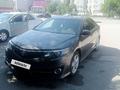 Toyota Camry 2014 года за 8 400 000 тг. в Актобе