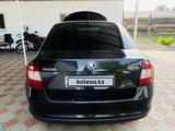 Skoda Rapid 2014 года за 3 300 000 тг. в Талдыкорган – фото 2