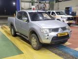 Mitsubishi L200 2013 года за 4 990 000 тг. в Караганда