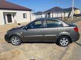Kia Rio 2010 года за 2 700 000 тг. в Атырау – фото 4