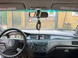 Mitsubishi Lancer 2005 года за 2 000 000 тг. в Астана – фото 3