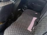 Renault Logan 2015 года за 3 000 000 тг. в Атырау – фото 4