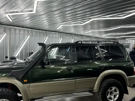 Nissan Patrol 2002 года за 9 500 000 тг. в Алматы – фото 31
