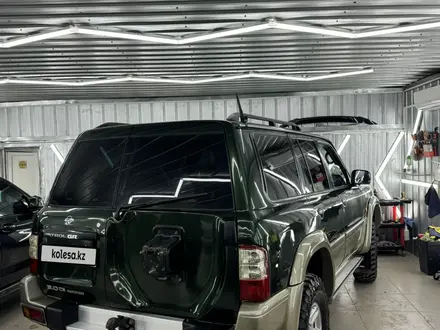 Nissan Patrol 2002 года за 9 500 000 тг. в Алматы – фото 32