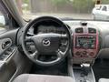 Mazda 323 2002 годаfor3 350 000 тг. в Алматы – фото 13