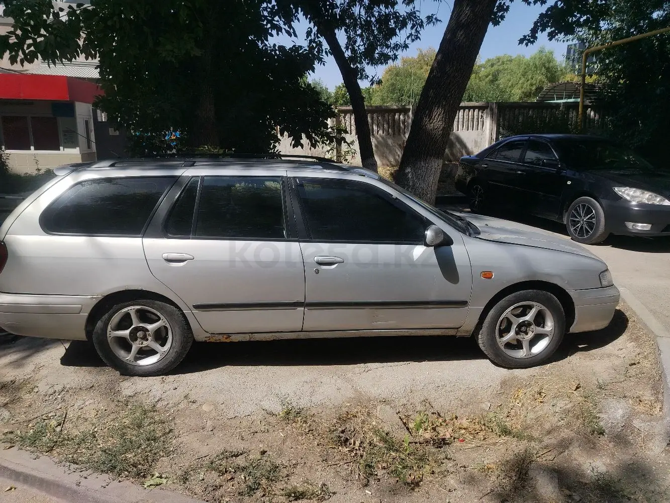 Nissan Primera, 1998