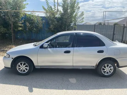 Mazda Familia, 1998