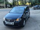 Volkswagen Touran 2010 года за 4 500 000 тг. в Актобе – фото 2