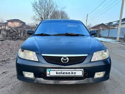 Mazda 323 2000 года за 2 200 000 тг. в Шамалган – фото 7