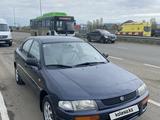 Mazda 323 1997 года за 2 400 000 тг. в Актобе – фото 2