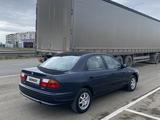 Mazda 323 1997 года за 2 400 000 тг. в Актобе – фото 5