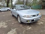 Mitsubishi Carisma 1997 года за 1 650 000 тг. в Алматы – фото 2