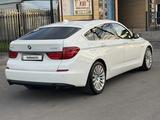 BMW Gran Turismo 2013 года за 8 560 000 тг. в Алматы