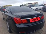 BMW 750 2009 года за 6 000 000 тг. в Астана – фото 2