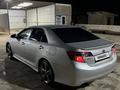 Toyota Camry 2014 года за 9 500 000 тг. в Жанаозен – фото 9