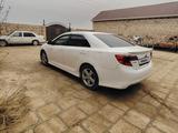 Toyota Camry 2013 года за 8 200 000 тг. в Жанаозен – фото 3