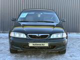 Mazda 626 1998 года за 2 700 000 тг. в Актобе – фото 2