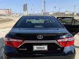 Toyota Camry 2015 года за 5 900 000 тг. в Жанаозен