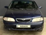 Mazda 626 1999 года за 1 900 000 тг. в Алматы – фото 4