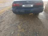 Toyota Camry 1998 года за 2 600 000 тг. в Сарыкемер – фото 4