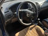Mazda 323 2002 года за 1 250 000 тг. в Шымкент – фото 4